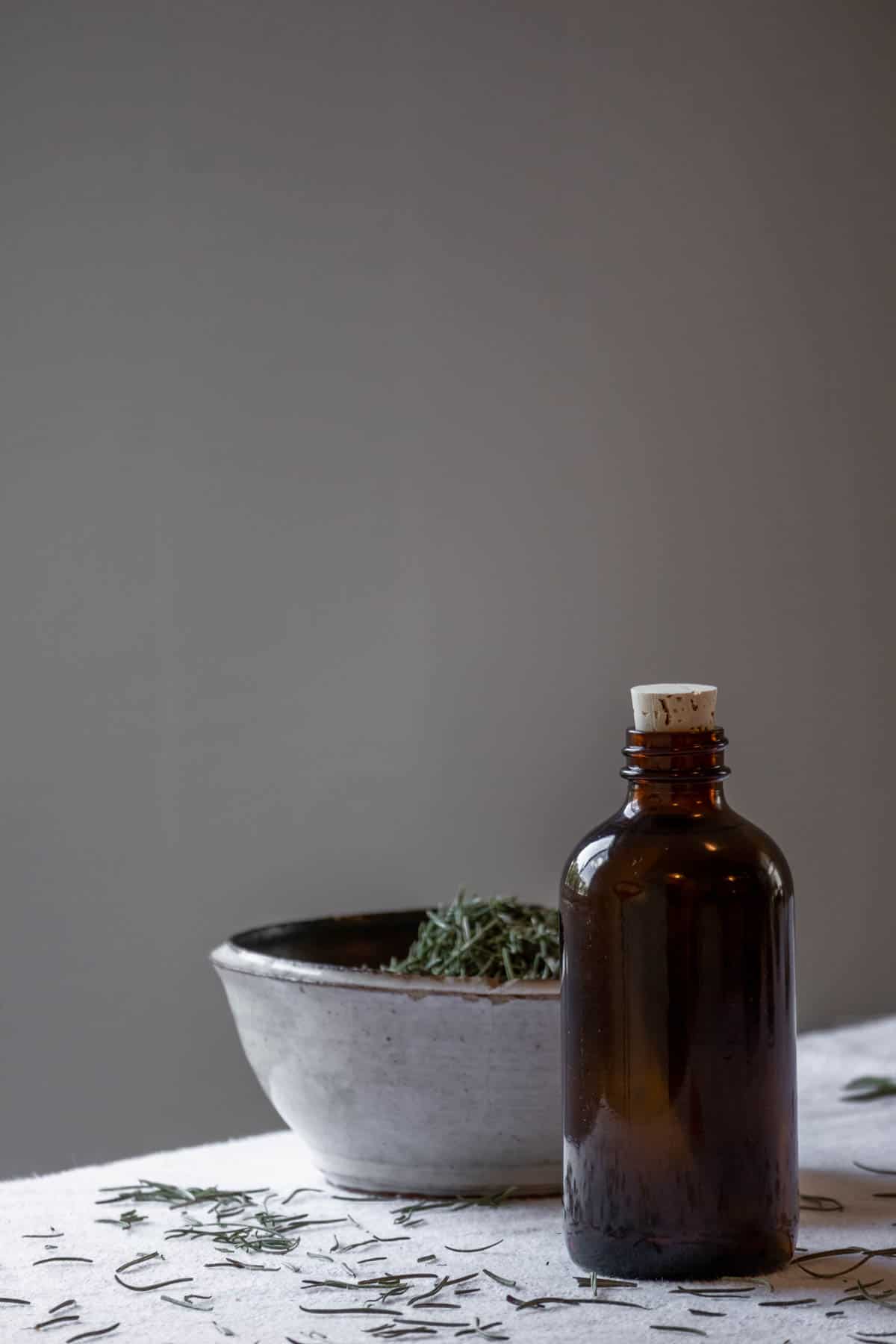 An apothecary bottle of rosemary oil